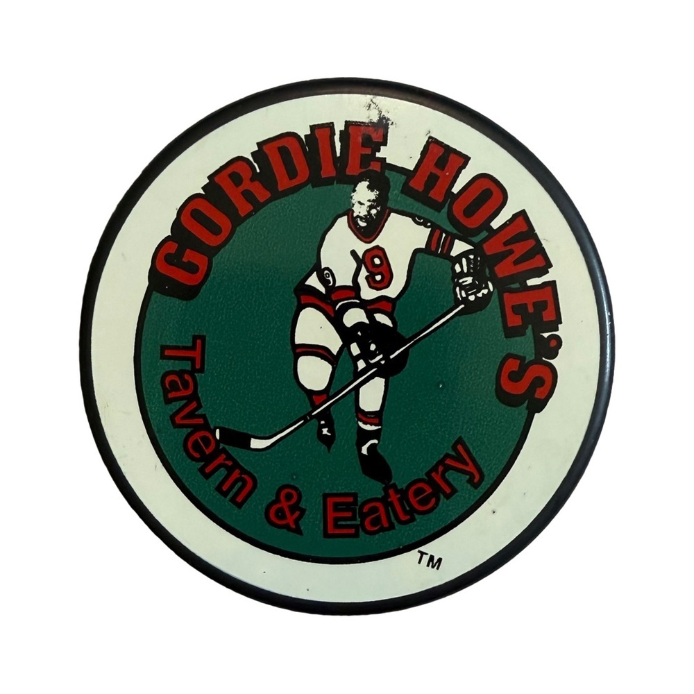 GORDIE HOWE / NHL RARE “GORDIE HOWE’S TAVERN AND EATERY” COLLECTIBLE HOCKEY PUCK